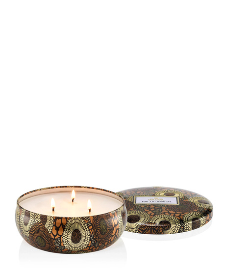 Voluspa's unique coconut wax blend is hand-poured into a 12 oz. metal vessel adorned in decorative pattern with a lid that keeps the candle dust-free when not in use.