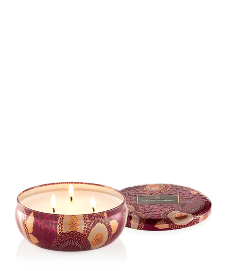 Voluspa's unique coconut wax blend is hand-poured into a 12 oz. metal vessel adorned in decorative pattern with a lid that keeps the candle dust-free when not in use.