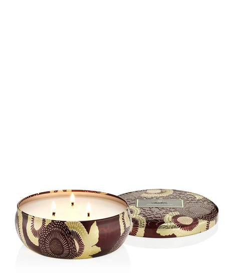 Voluspa's unique coconut wax blend is hand-poured into a 12 oz. metal vessel adorned in decorative pattern with a lid that keeps the candle dust-free when not in use.