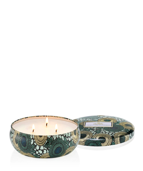 Voluspa's unique coconut wax blend is hand-poured into a 12 oz. metal vessel adorned in decorative pattern with a lid that keeps the candle dust-free when not in use.