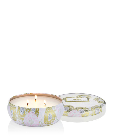 Voluspa's unique coconut wax blend is hand-poured into a 12 oz. metal vessel adorned in decorative pattern with a lid that keeps the candle dust-free when not in use.