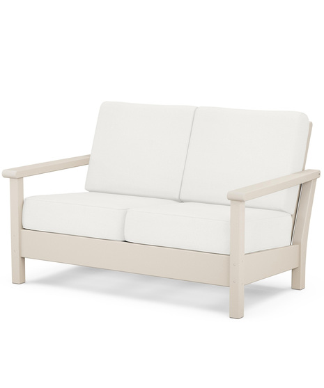 Haanrbour Deep Seating Loveseat is the perfect addition to your outdoor living area designed with contemporary lines and premium comfort