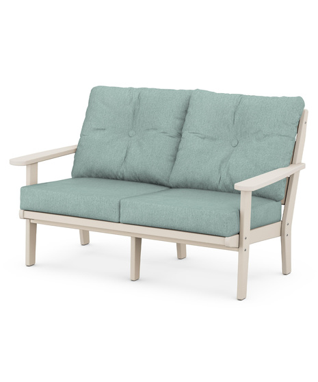 The Lakeside Deep Seating Lovseat seats up to two and achieves laid-back comfort and style with plush pillow-back cushions and a timeless back design. 