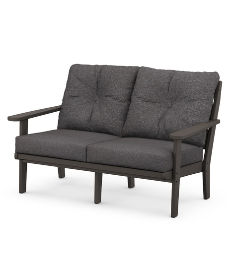 The Lakeside Deep Seating Lovseat seats up to two and achieves laid-back comfort and style with plush pillow-back cushions and a timeless back design. 