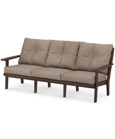 The Lakeside Deep Seating Sofa seats up to three and achieves laid-back comfort and style with plush pillow-back cushions and timeless back design.