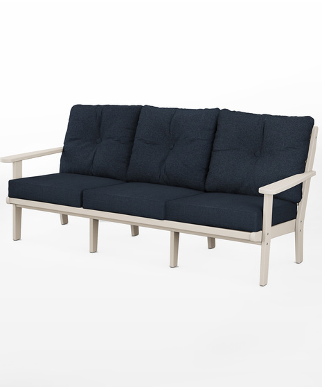 The Lakeside Deep Seating Sofa seats up to three and achieves laid-back comfort and style with plush pillow-back cushions and timeless back design.