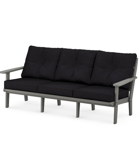 The Lakeside Deep Seating Sofa seats up to three and achieves laid-back comfort and style with plush pillow-back cushions and timeless back design.