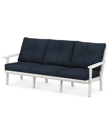 The Lakeside Deep Seating Sofa seats up to three and achieves laid-back comfort and style with plush pillow-back cushions and timeless back design.