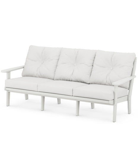 The Lakeside Deep Seating Sofa seats up to three and achieves laid-back comfort and style with plush pillow-back cushions and timeless back design.