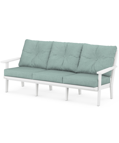 The Lakeside Deep Seating Sofa seats up to three and achieves laid-back comfort and style with plush pillow-back cushions and timeless back design.