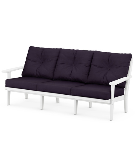 The Lakeside Deep Seating Sofa seats up to three and achieves laid-back comfort and style with plush pillow-back cushions and timeless back design.