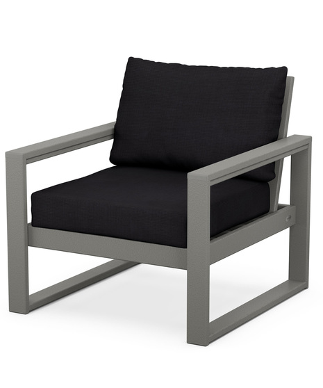 With sleek, angular lines, this modern deep seating chair features a plush pillow-back cushion as well as a supportive seat cushion covered in high-performance outdoor fabric.