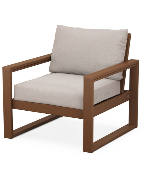 With sleek, angular lines, this modern deep seating chair features a plush pillow-back cushion as well as a supportive seat cushion covered in high-performance outdoor fabric.