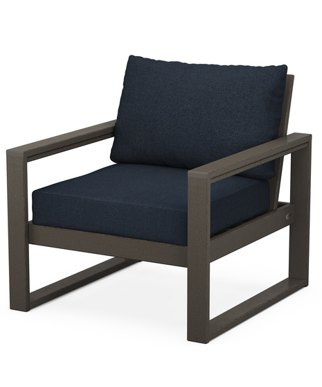 With sleek, angular lines, this modern deep seating chair features a plush pillow-back cushion as well as a supportive seat cushion covered in high-performance outdoor fabric.