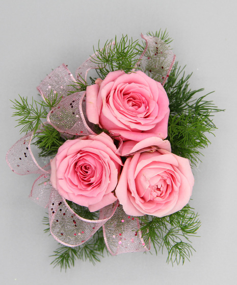 3 spray roses, ribbon and greenery