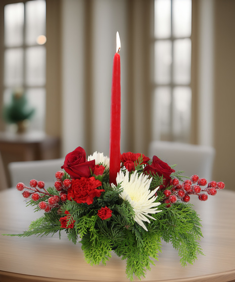 Merry & Bright centerpiece with red candle, evergreens, carnations, spider mums & red berries. A simple, classic holiday touch.