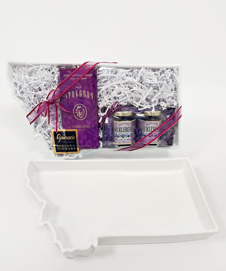 Montana Love Gift Basket with huckleberry chocolate, jam & honey in a ceramic Montana tray. A sweet, shippable gift from Big Sky Country