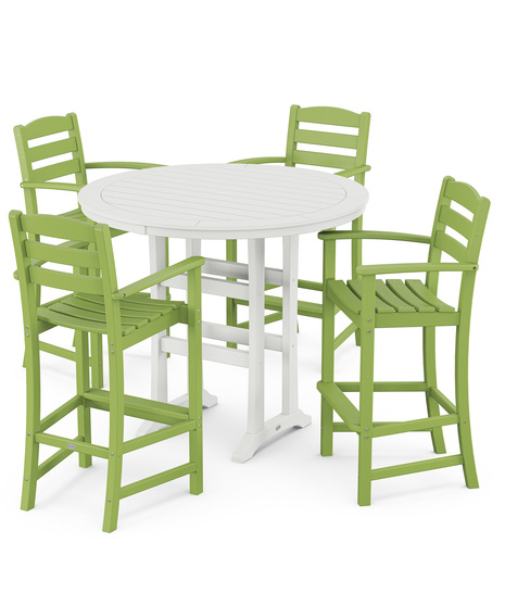 This bar-height table seats four and features a table top with rounded edges and space for plenty of leg room underneath paired with traditional La Casa Café Bar Arm Chairs