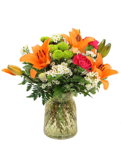 Say hello to happiness with this bouquet featuring carnations, Asiatic lilies and more designed  in a colored glass vase ready to bring a burst of joy to someone special.
