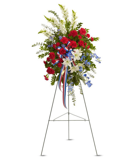 Standing tall, proud and patriotic, this dazzling free-standing spray is like a fireworks display made of graceful flowers.
