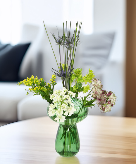 Woodland Whimsy bouquet with eryngium, bupleurum & solidago in a mushroom vase. Petite, whimsical floral gift perfect for gifting