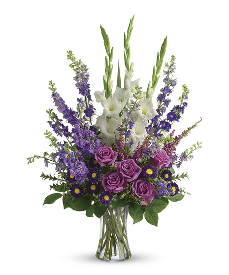 Lavender and white sympathy flowers make a grand statement in this joyful bouquet