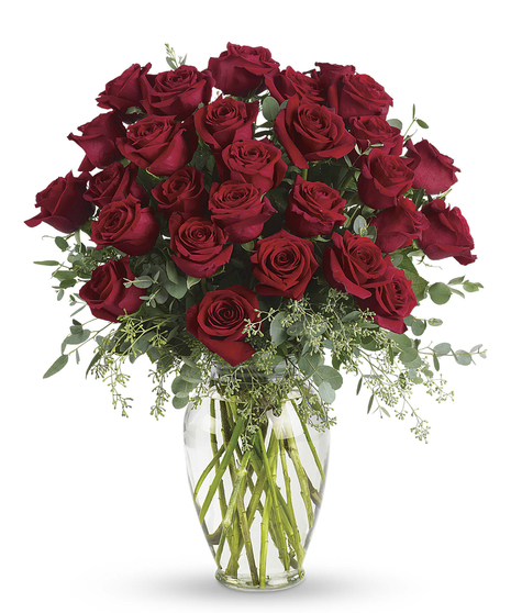 A beautiful rose arrangement symbolizes a shared life or a shared sacred moment. All will be dignified beautifully with this loving gift of roses in a vase.