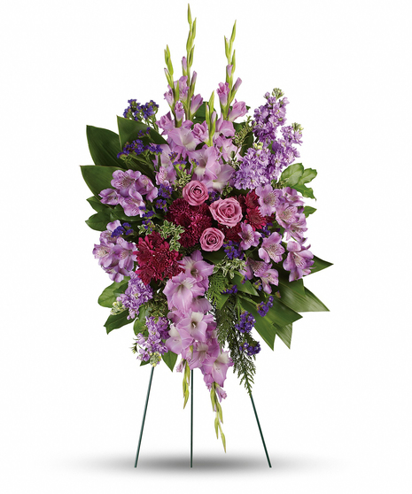 Console and comfort with this luxurious spray of lavender roses, alstroemeria and gladioli. It's a majestic way to remember the departed at the memorial service.