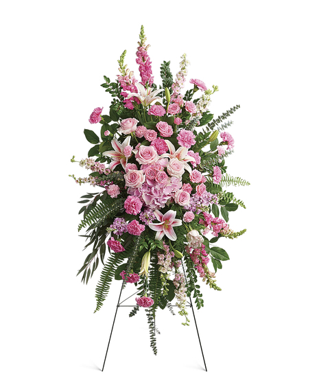This glorious spray of pink hydrangea, roses and lilies is an especially fond, feminine farewell to one deeply loved.