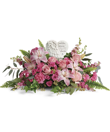 A heartfelt celebration of a truly special life, this magnificent bouquet of pink roses and lilies