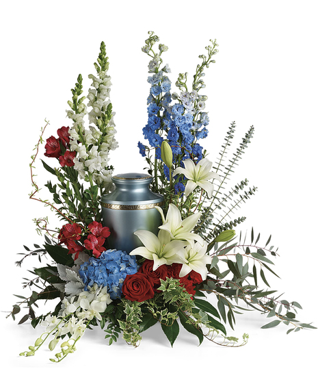 Proud and patriotic, this boldly designed red, white and blue bouquet displays the cremation urn with honor.