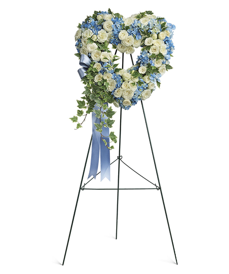 Adorned with trailing ivy, this petite, 16
